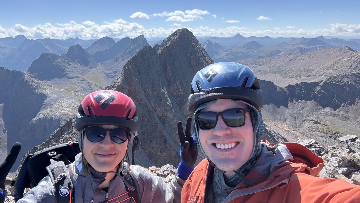 Randall and Maya smiling at the top of West Trinity
